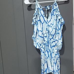 Ruffled cold shoulder romper.